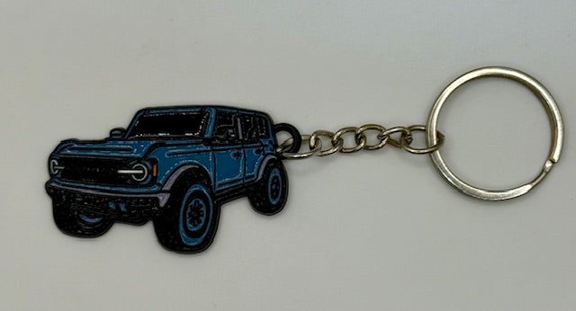 Keychain with a Area 51/Azure gray SUV design on a white background