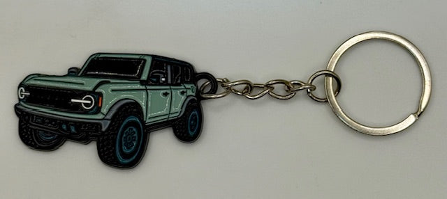 Keychain with a cactus gray SUV design on a white background